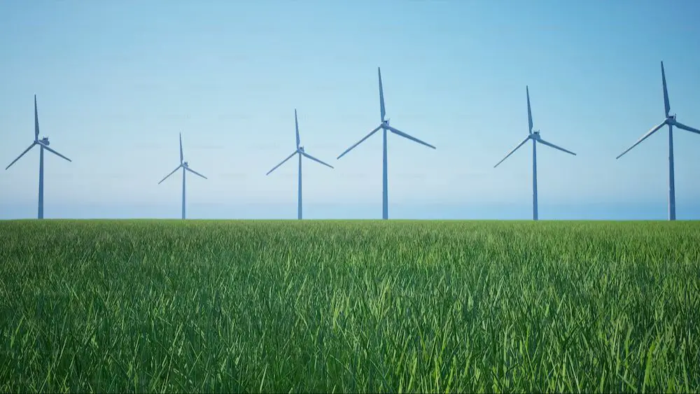 row of wind turbines in a field