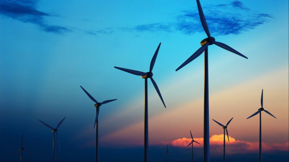 wind turbines spinning to generate affordable electricity.