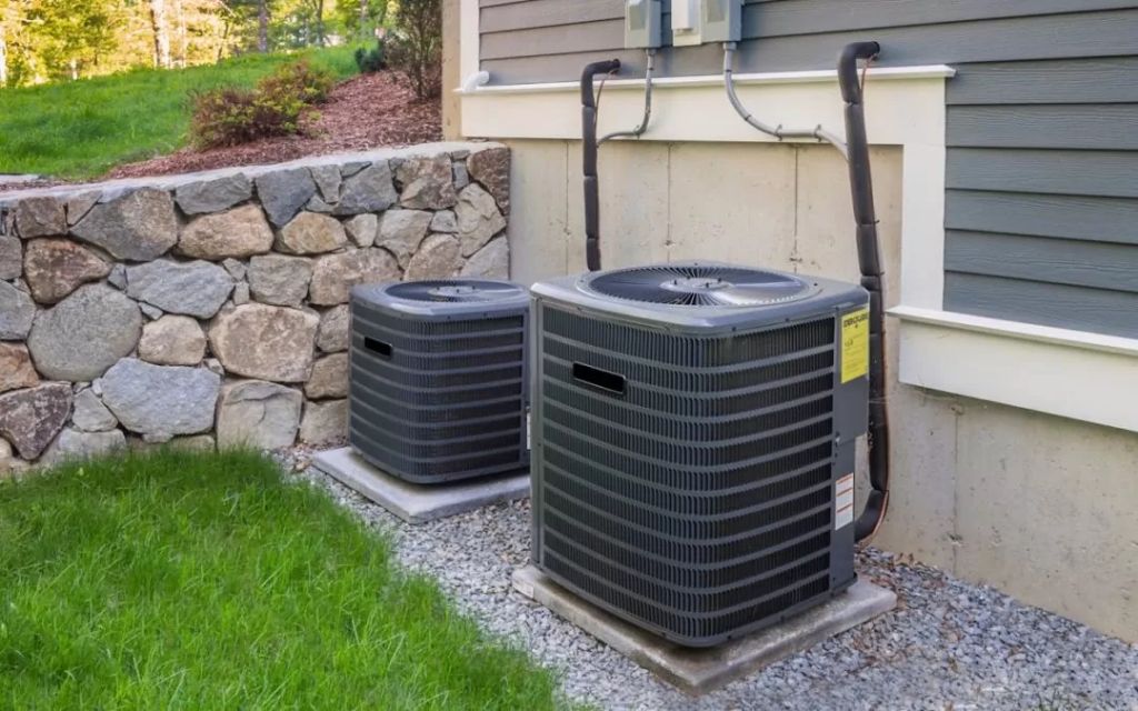 an air conditioning unit sitting outside a home.