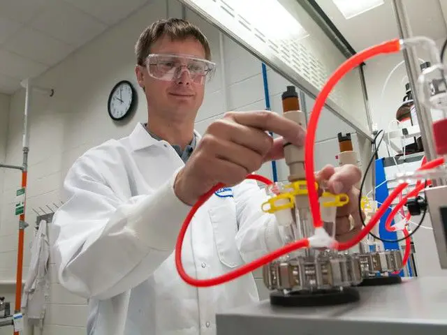 biofuel engineer conducting experiment in lab