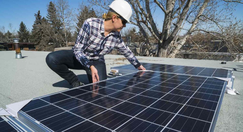solar panels being installed on a residential rooftop.