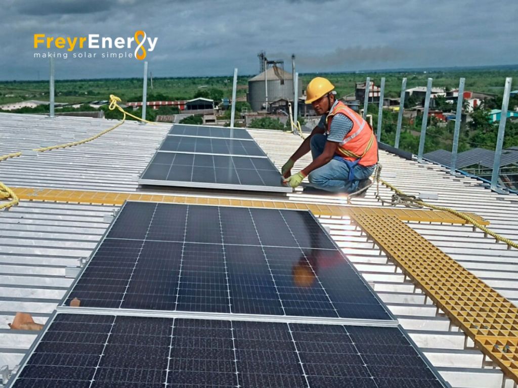 solar panels being installed on a rooftop