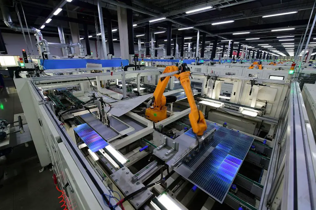 solar panels being manufactured in a chinese factory