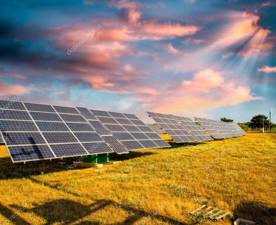solar panels in a sunny field