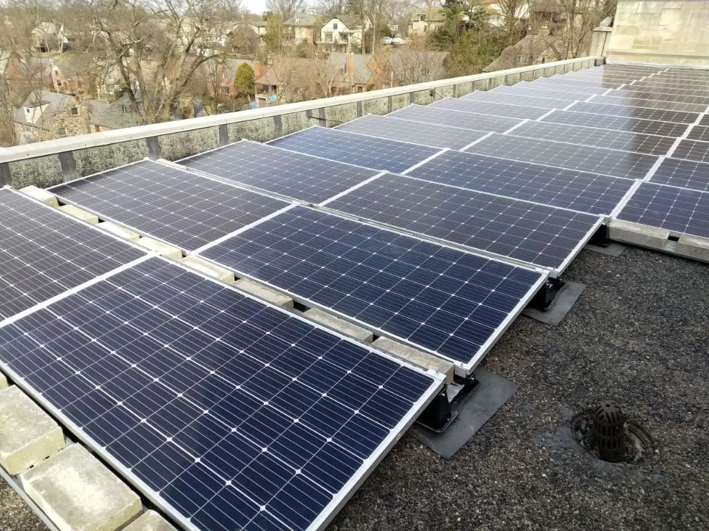 solar panels installed on a home's roof to collect energy.