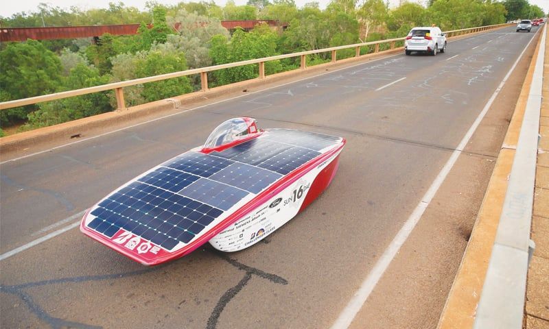 solar powered car racing across desert