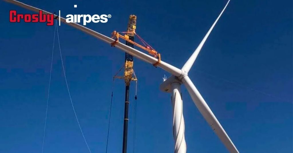 wind turbines use blades to capture kinetic wind energy.