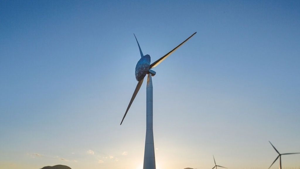 wind turbines use large blades to capture the kinetic energy of wind to generate renewable electricity