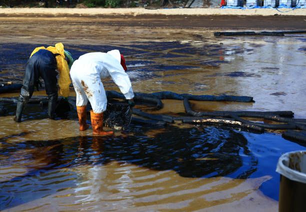 an image showing oil pollution in the ocean from an offshore oil platform.