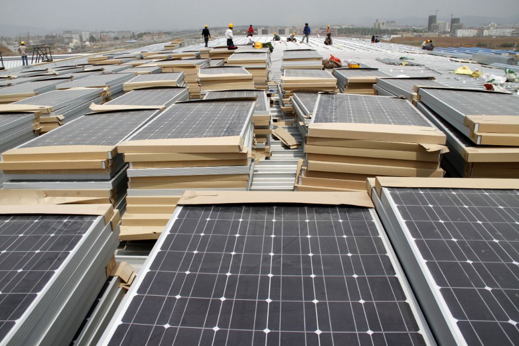 solar panels installation on a roof to generate clean energy.