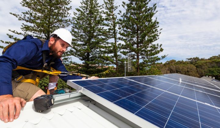 solar panels on rooftops generating renewable electricity from sunlight