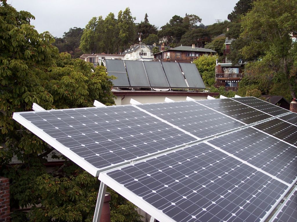solar panels on the roof of a house generating electricity.