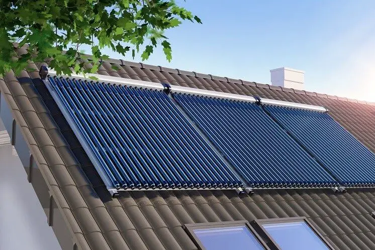 solar thermal collector panels mounted on a roof to provide space heating and hot water for a building.