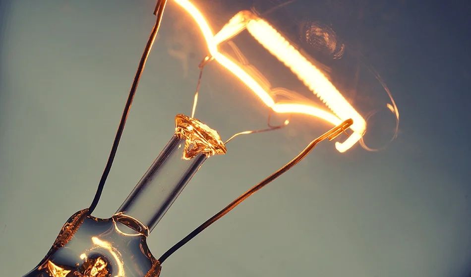 tungsten filament inside lightbulb glows when heated